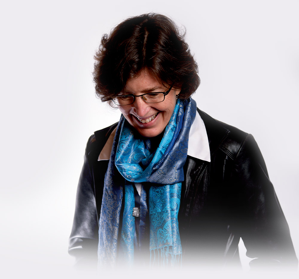 Jeanne Minahan McGinn Jeanne Minahan McGinn smiling for a professional portrait
