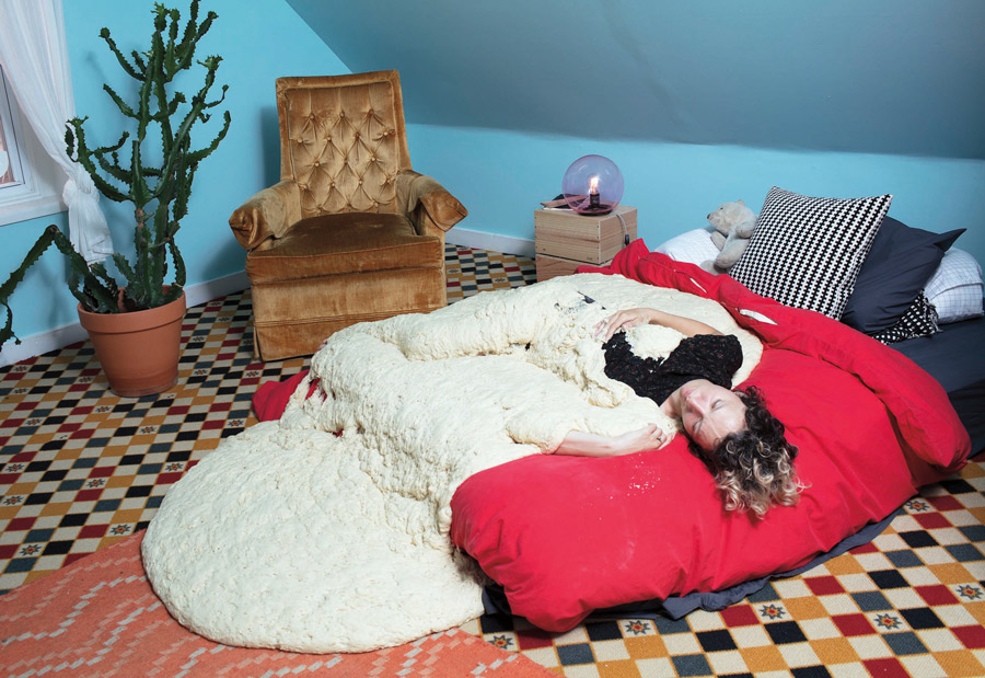 Santina Amato Santina Amato laying in a bed