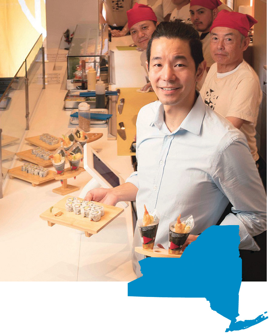 Kevin Takarada ’02 Kevin Takarada ’02 with his sushi restaurant crew.
