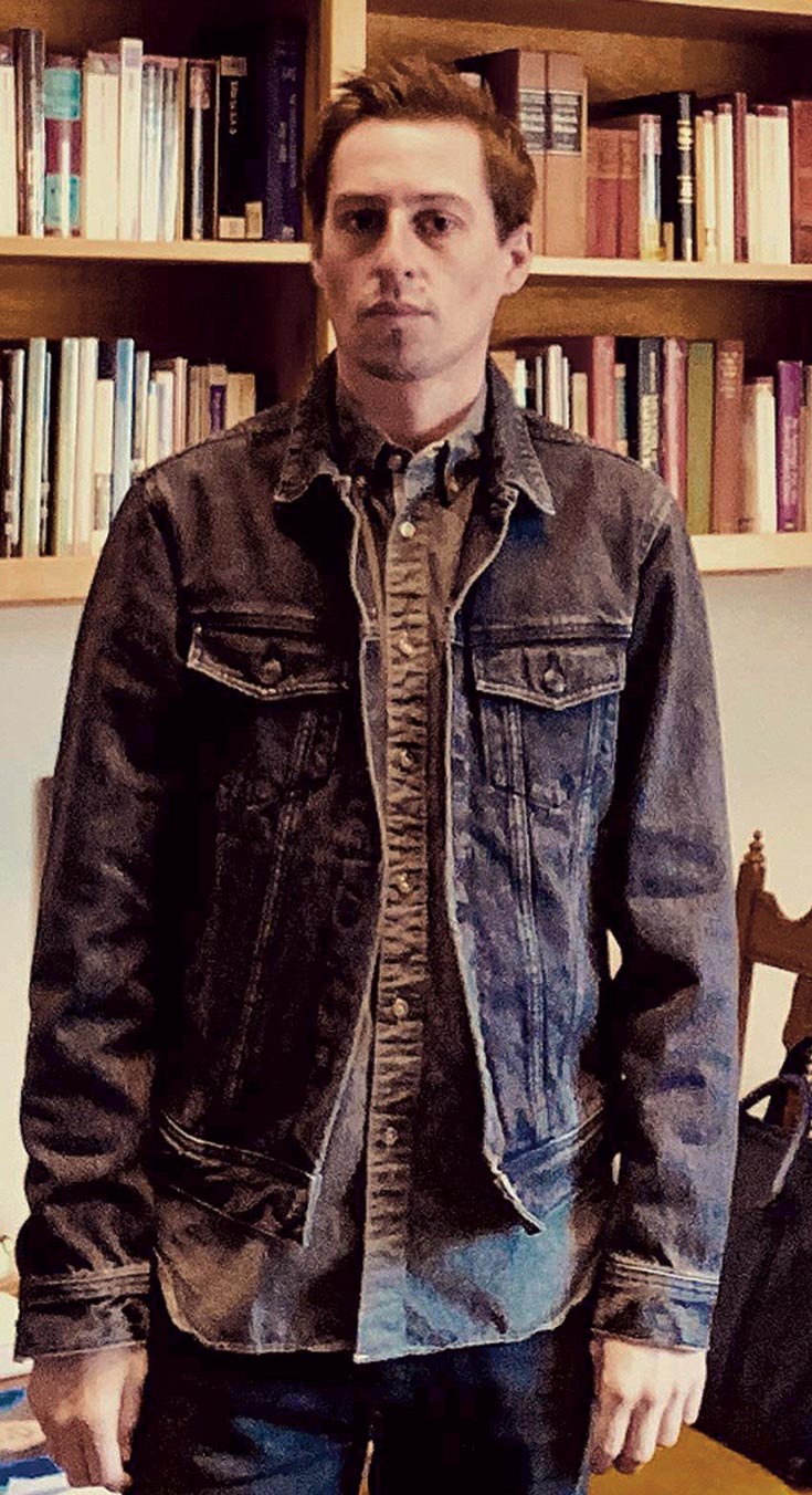 Aaron Hanlon Aaron Hanlon photographed, standing in an office