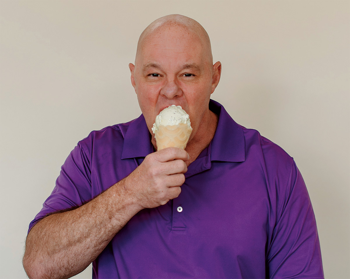 George Haymaker George Haymaker eating an ice cream cone in a purple polo shirt