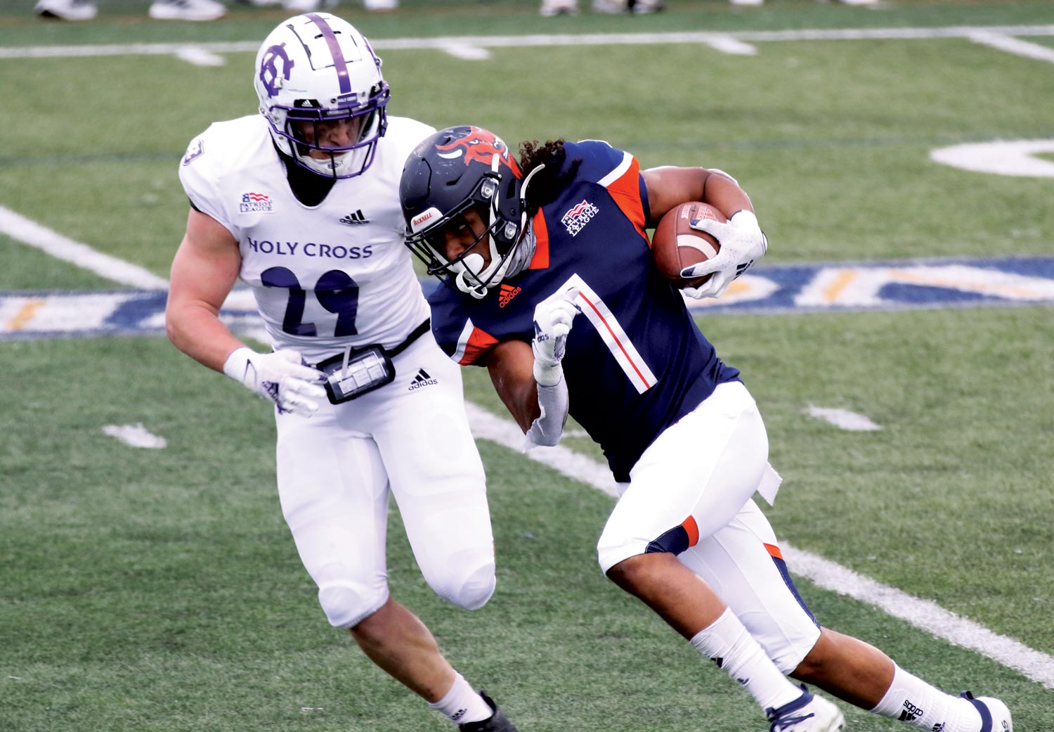 Dominic Lyles ’22 carries the ball in the Patriot League championship game this spring.