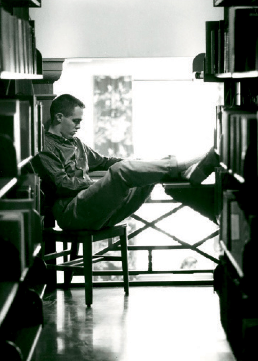 Student reading a book Student reading a book in the Bucknell library