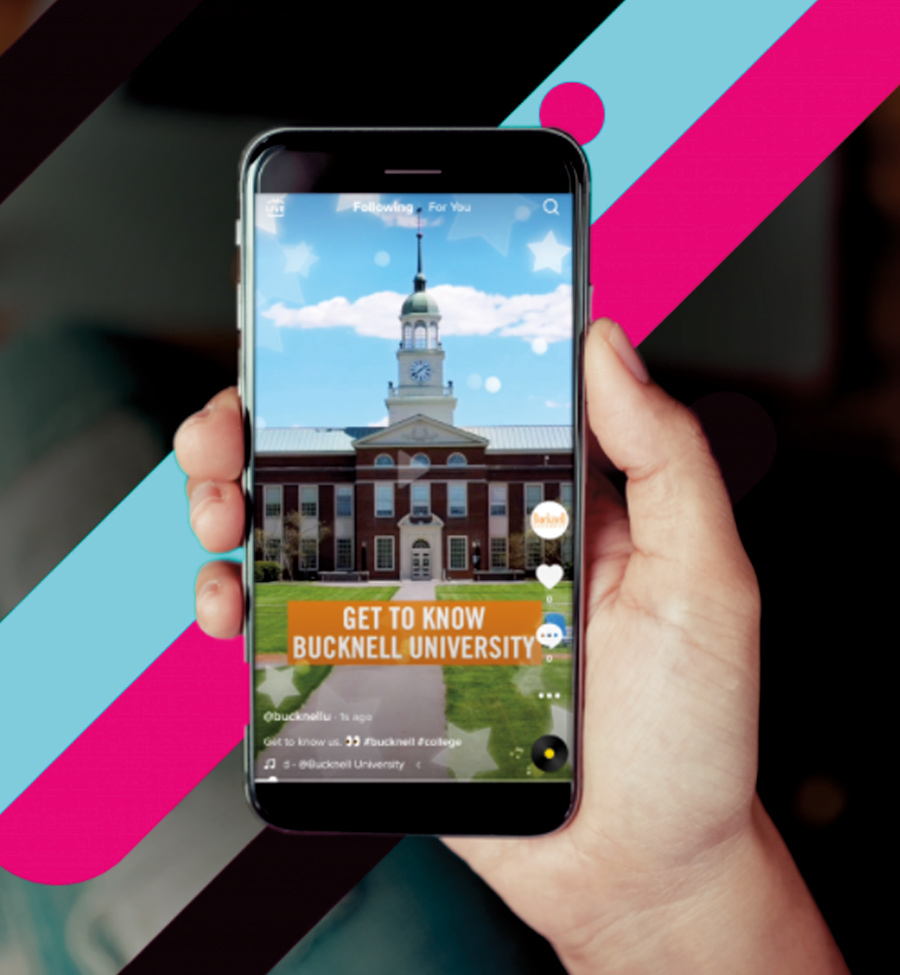 hand holding cell phone with the Bucknell University TikTok open