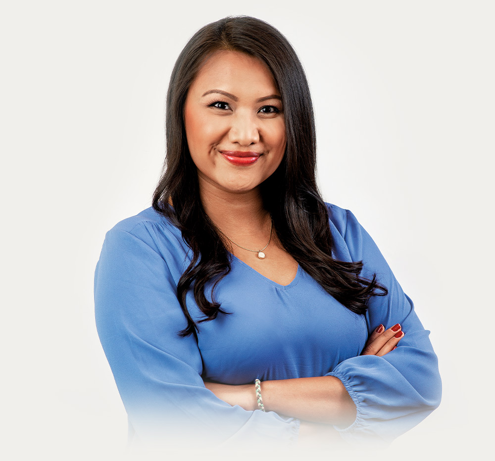 April Htut smiling with his arms crossed