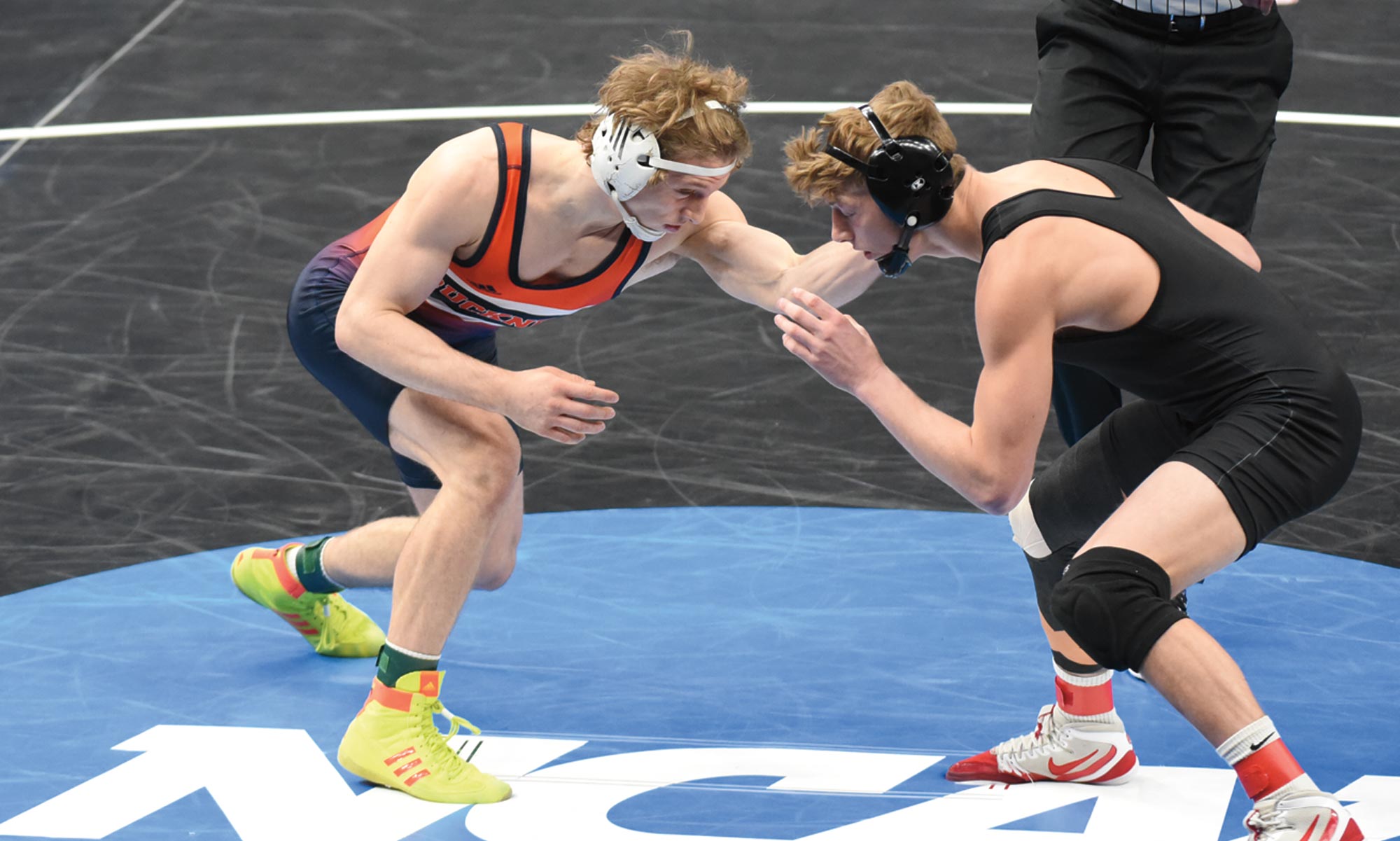 Pulling His Weight Zach Hartman (left) during a wrestling match