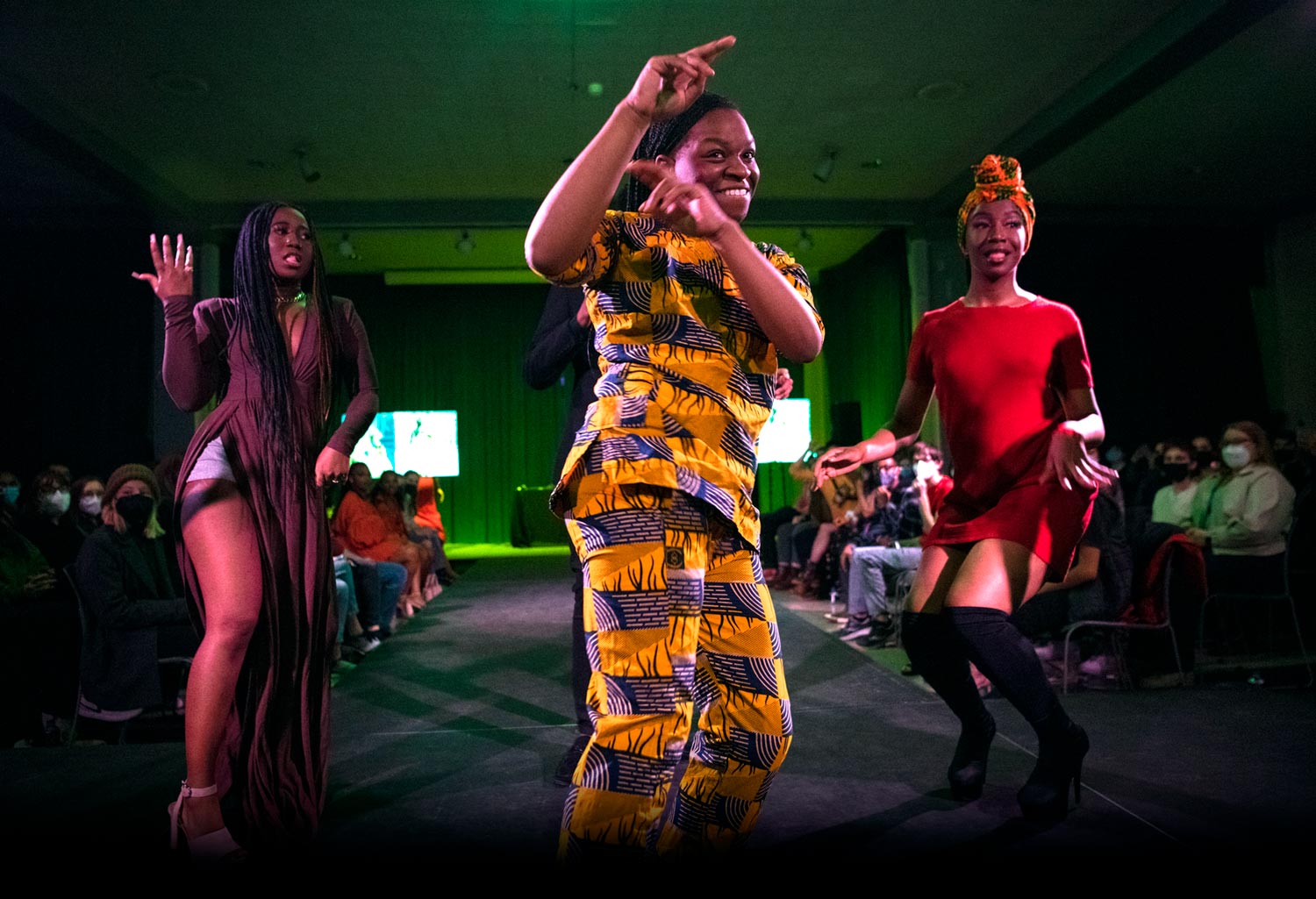 models posing at the end of the runway