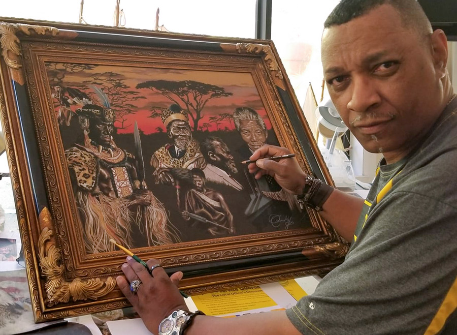 Greg Crumbly painting “African Lions”