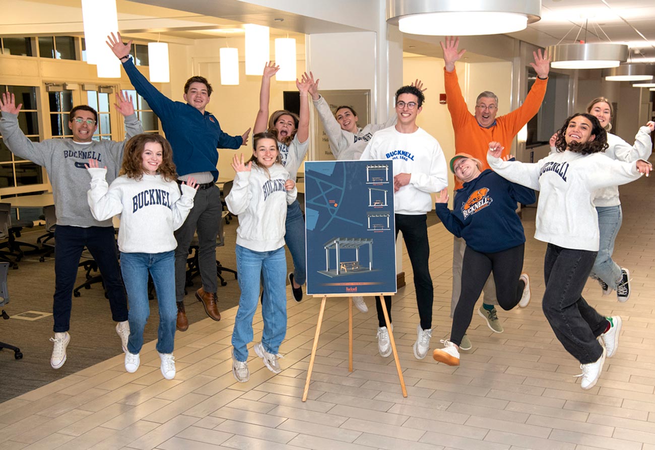 Leaving Their Mark Officers of the Class of 2022 jump in unison for a group photo