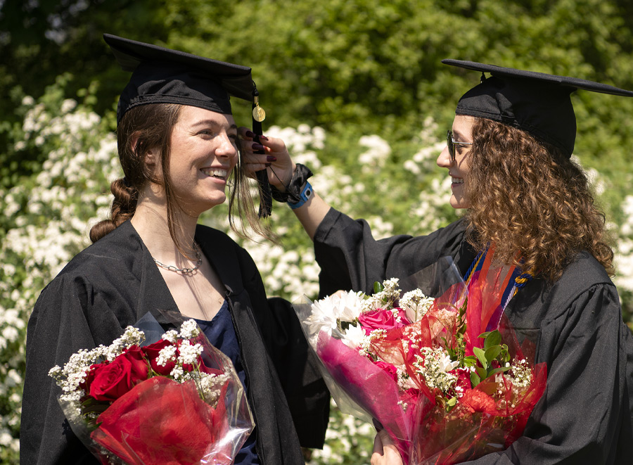 Graduates celebrate with each other