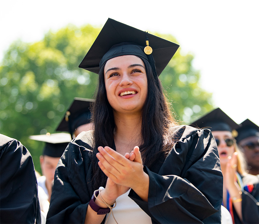 Bucknell graduate clapping her hands