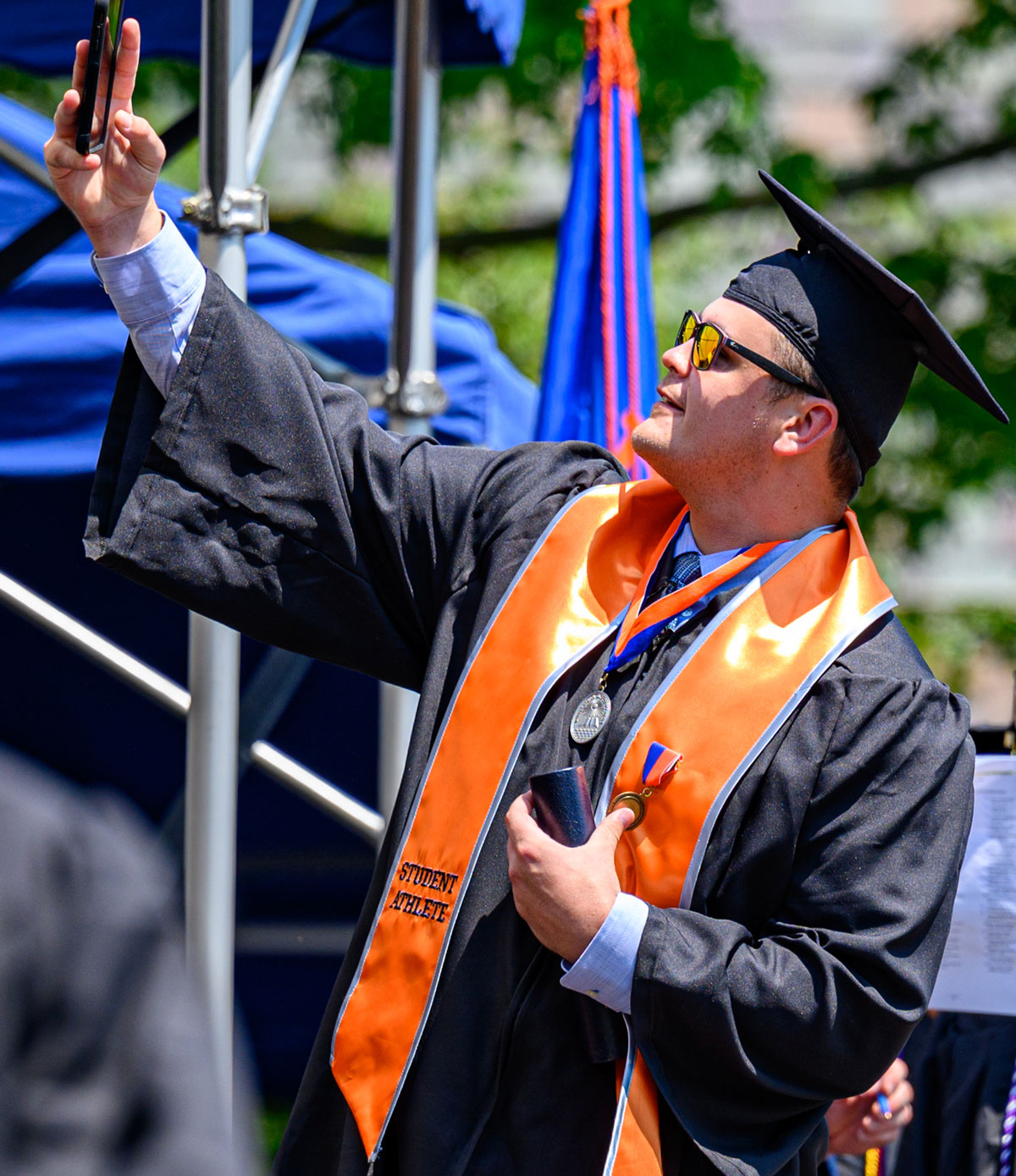 Graduate taking a selfie