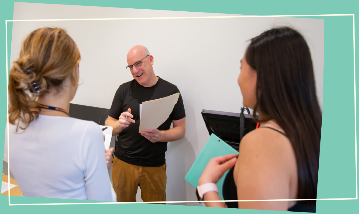 Professor speaking to students