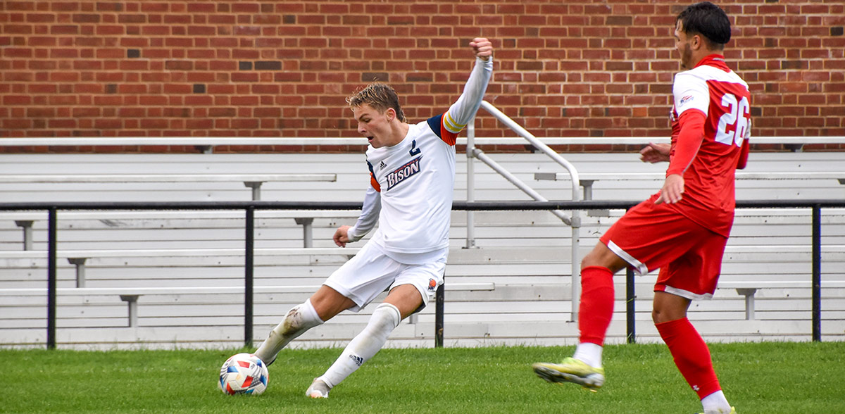 MJ Kuczura about to kick a ball
