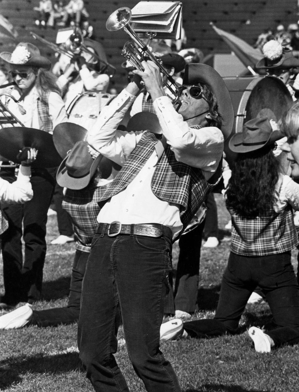 Witty Winners black and white photo of man passionately playing the trumpet