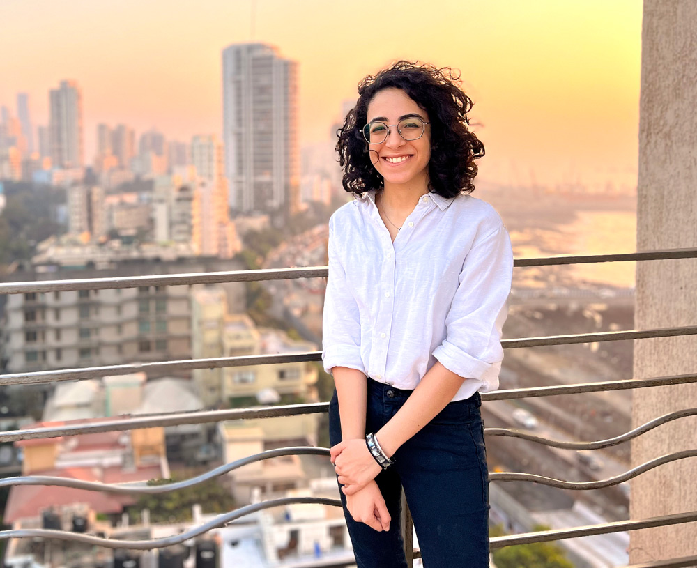 Anushka Mehrotra with skyline behind her