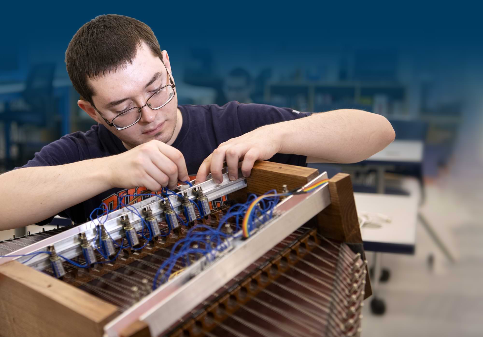 David Berry working with electrical wires