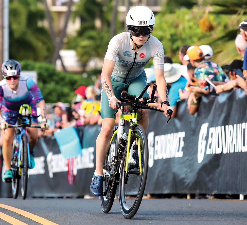 Ava Warfel riding a bike during a race