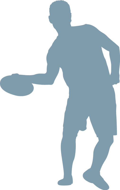 silhouette of a man playing frisbee