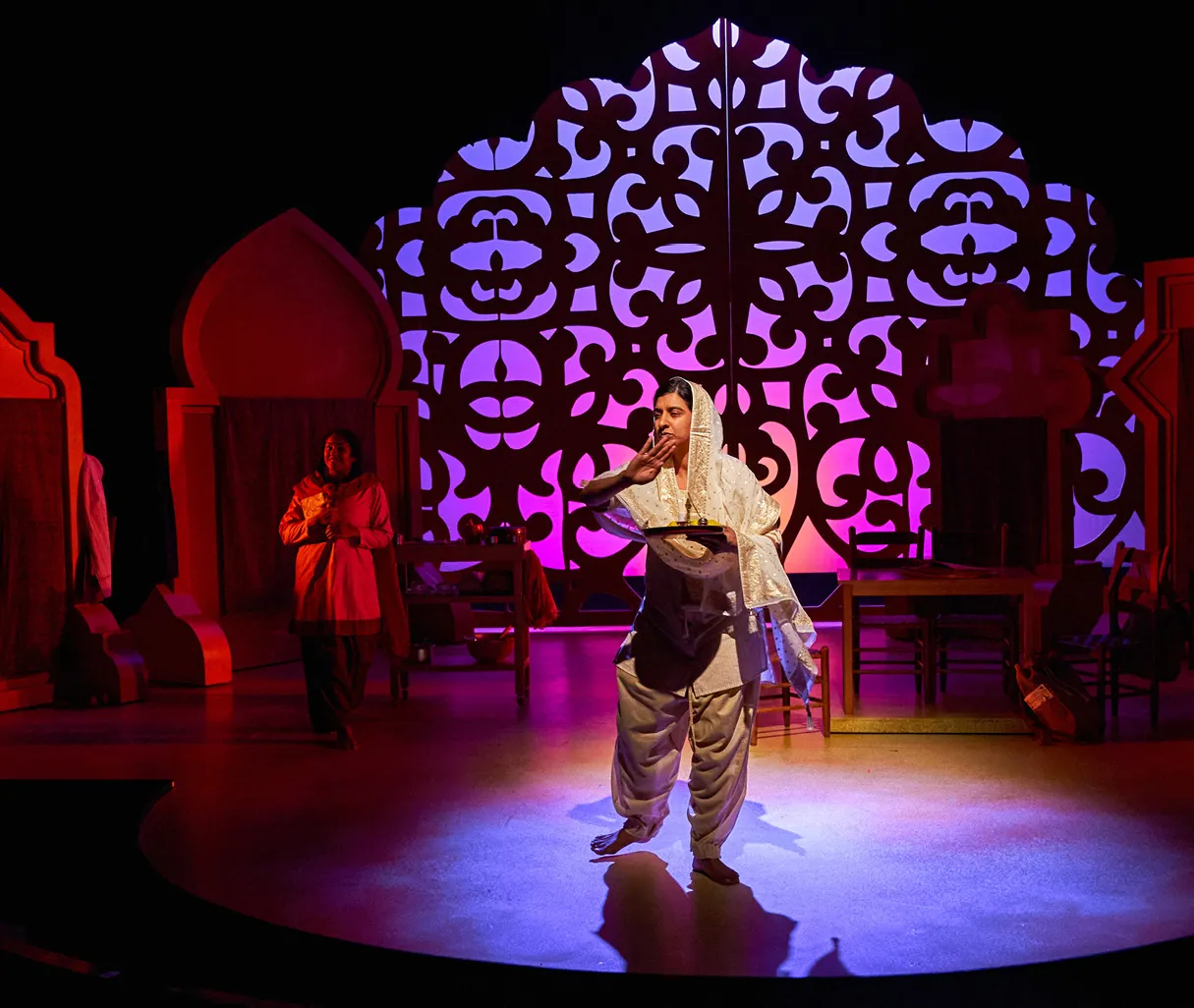 theatre performer in the spotlight on stage