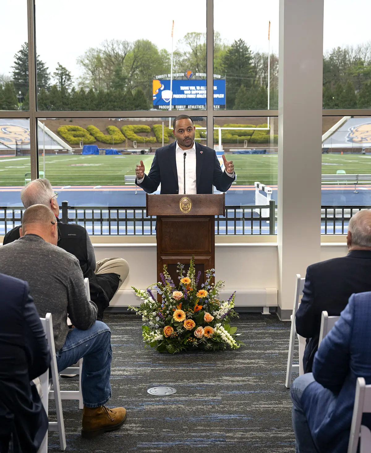 Jermaine Truax speaking at podium