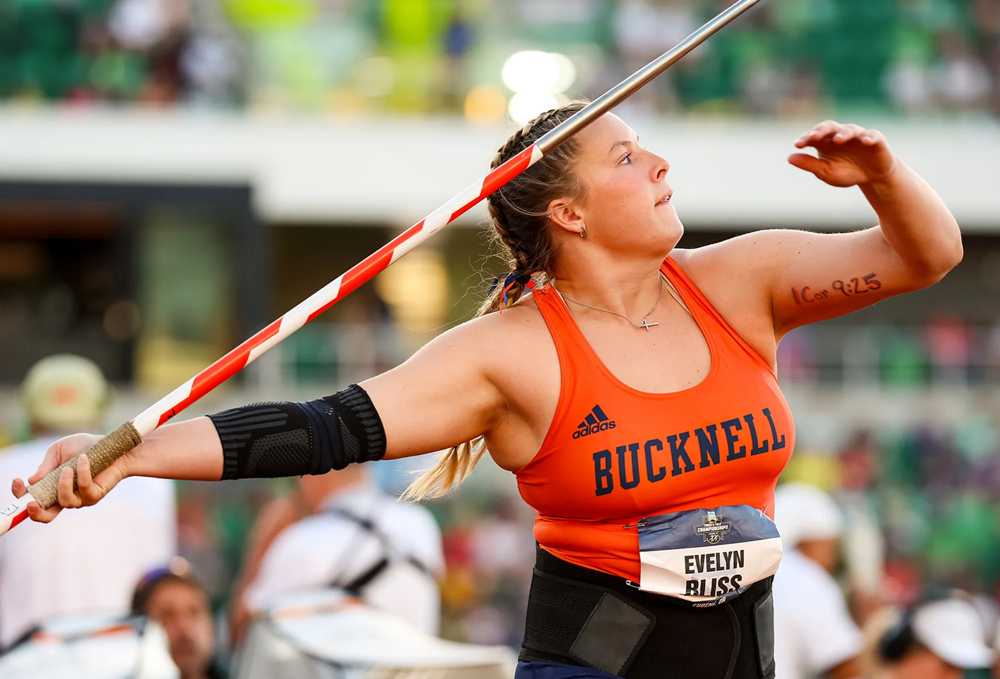Evie Bliss throwing a javelin