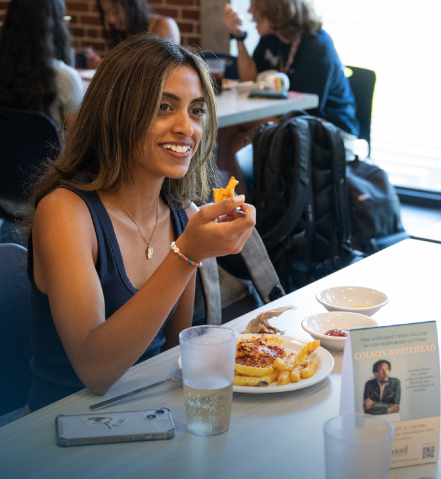 female student experiencing new dining experience