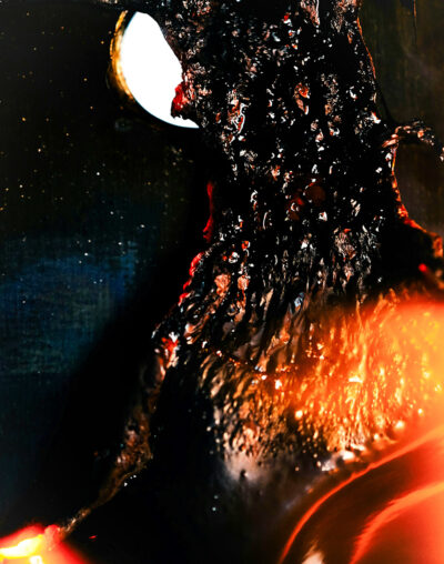 Person Holding a Burning Wood