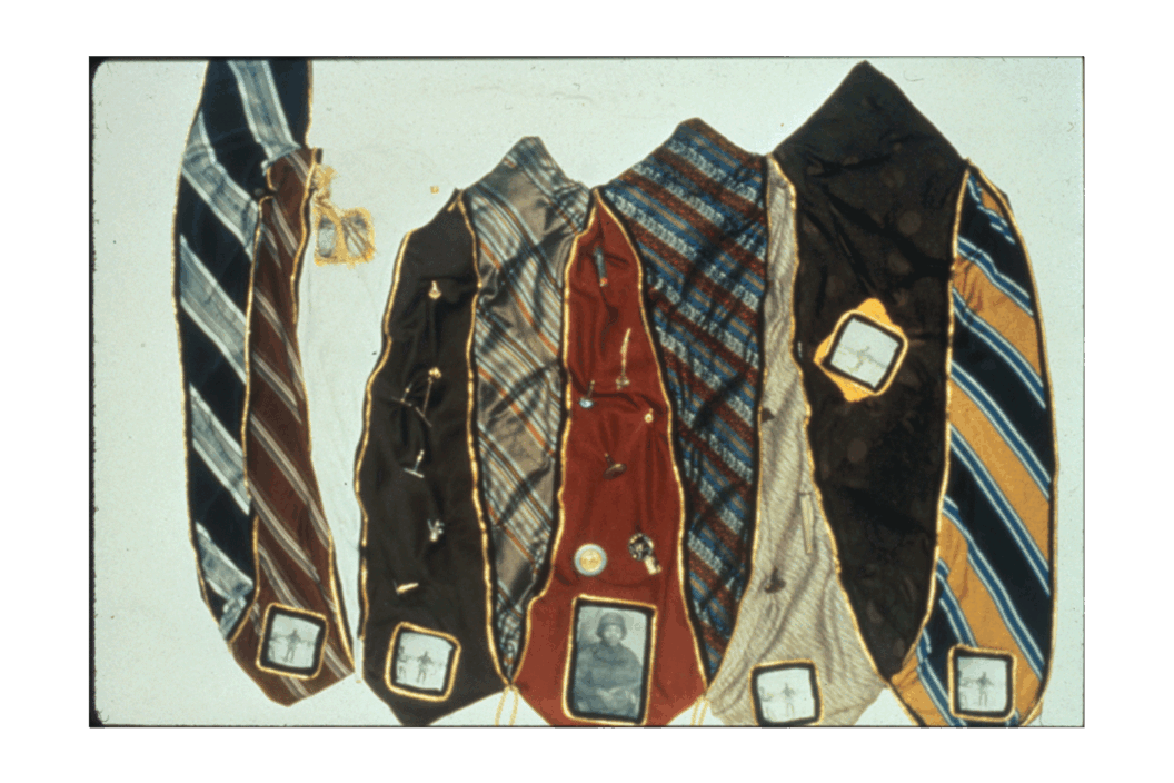 Color photograph of several neck ties.