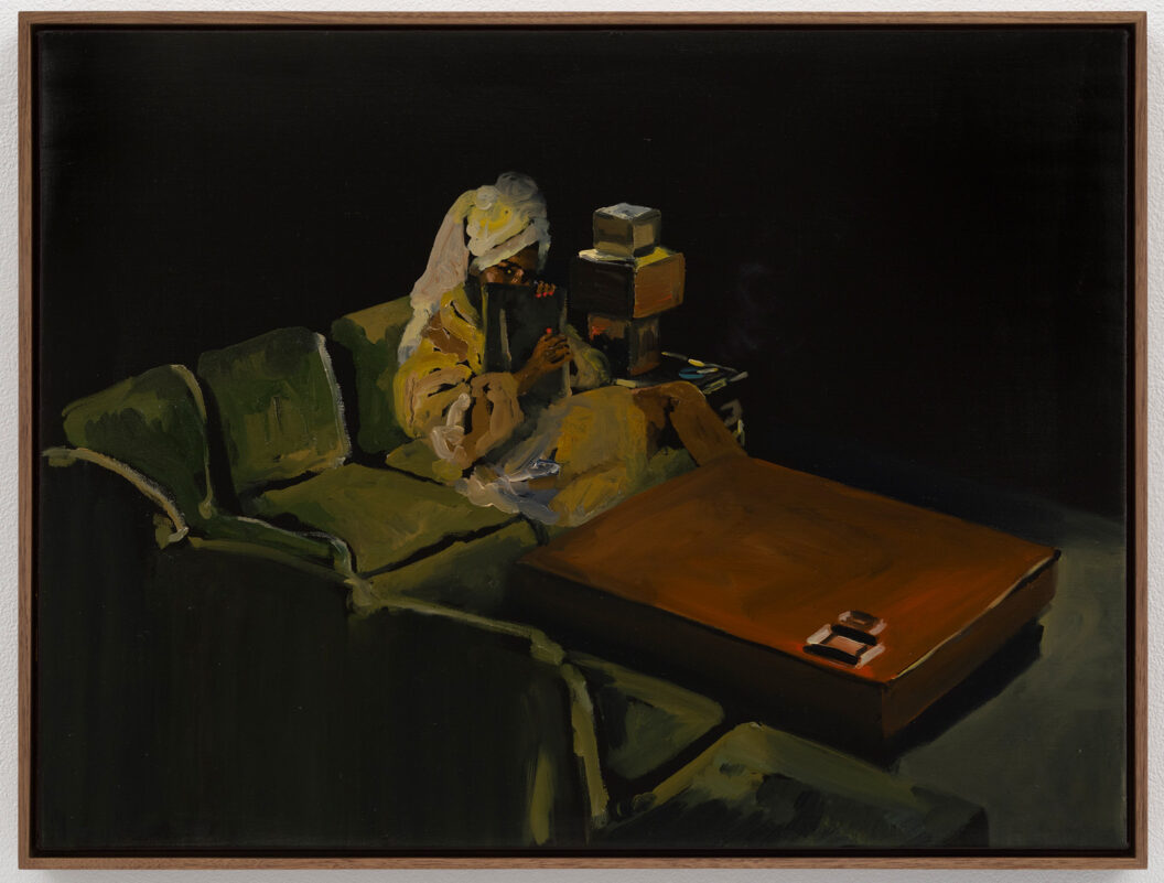 1600 A painting of a Black woman sitting on a couch with a book and a towel wrapped around her head.