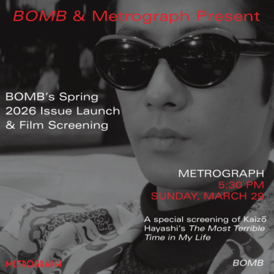 A black and white close up portrait of someone wearing dark sunglasses, a black turtleneck, and a patterned jacket staring off to the left.