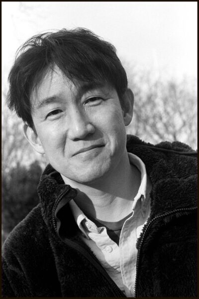 Black and white portrait of the author.