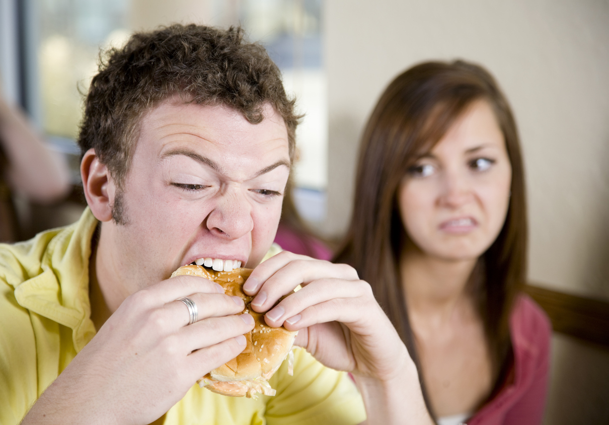 IStock - RichLegg - man eating badly