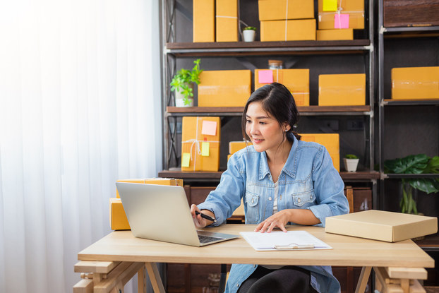 woman working on laptop at home