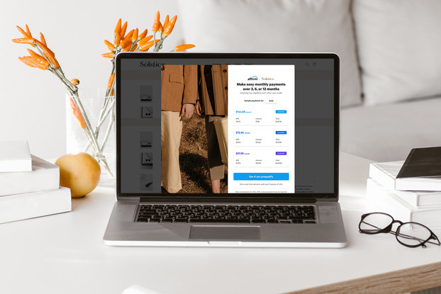 laptop on desk with affirm payment website on its screen