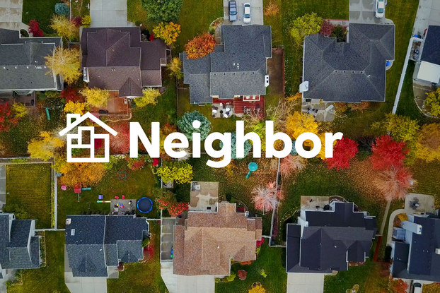 image of a residential neighborhood from the top promoting Neighbor self-storage