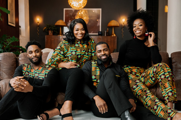 Models wearing clothing created by D'IYANU.