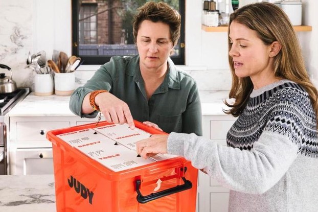 customers unboxing products from their judy emergency preparedness kit
