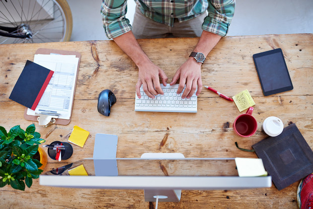 Entrepreneur works at his desk