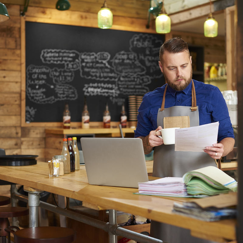 Entrepreneur checks his accounts