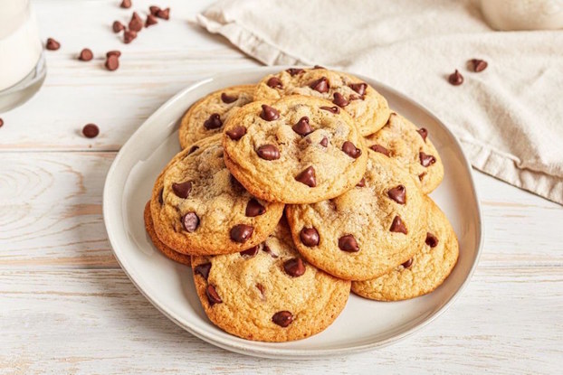 Plate of Nestlé Toll House cookies on a table.