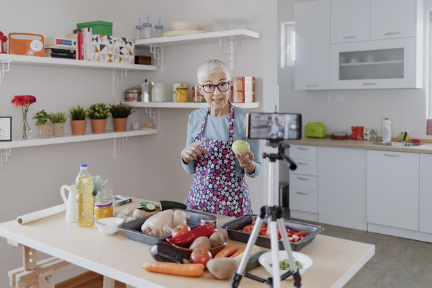 Woman records video of her following a recipe