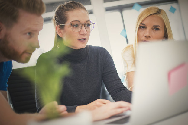 Colleagues collaborate on a business strategy