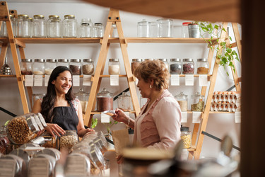  Mother and daughter working in their family business. 