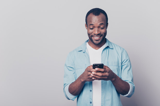Man browsing on his smartphone.