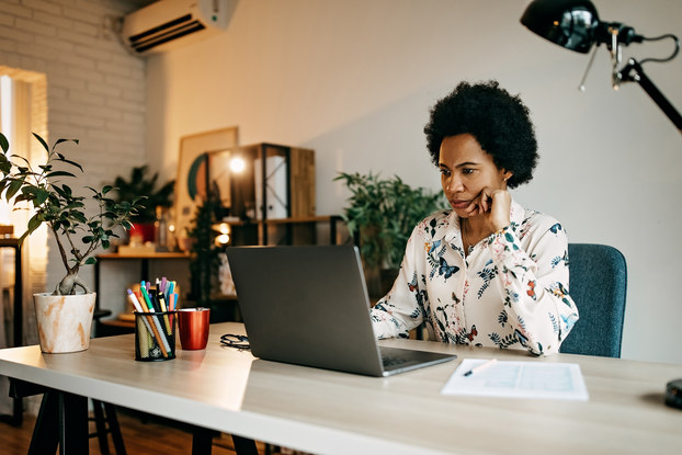 Busy business woman working from home office