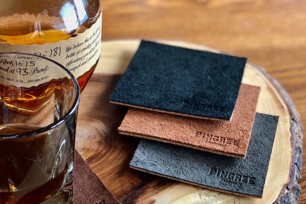 Products by Pingree displayed with whiskey.