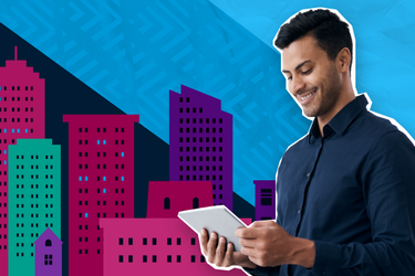Person holding tablet with colorful cartoon-like images of buildings in the background.