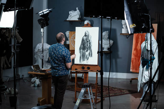 New Masters Academy instructor Iliya Mirochnik filming an art class.