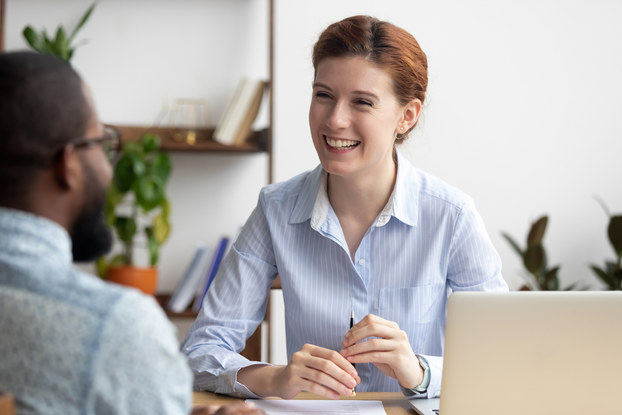 two employees in a meeting